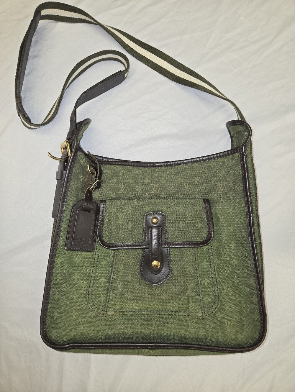 Green Louis Vuitton Monogram Mini Lin Besace Mary Kate bag.